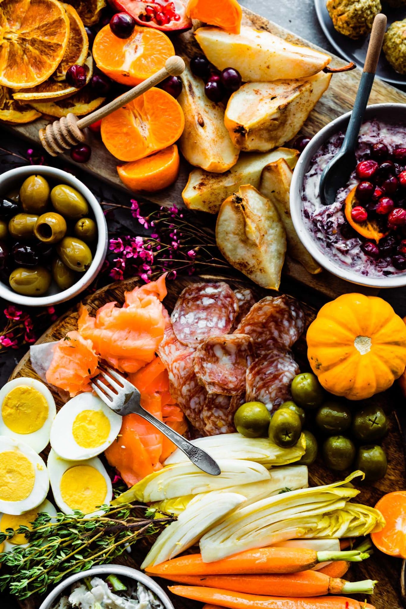 A portion of a thanksgiving grazing table with dried meats and fruit
