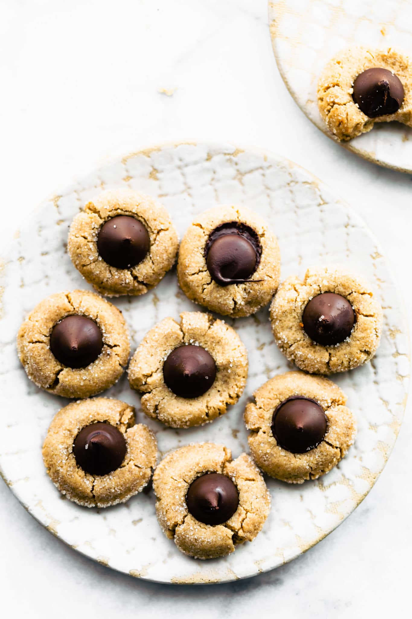 Gluten free peanut butter blossom cookies on a plate
