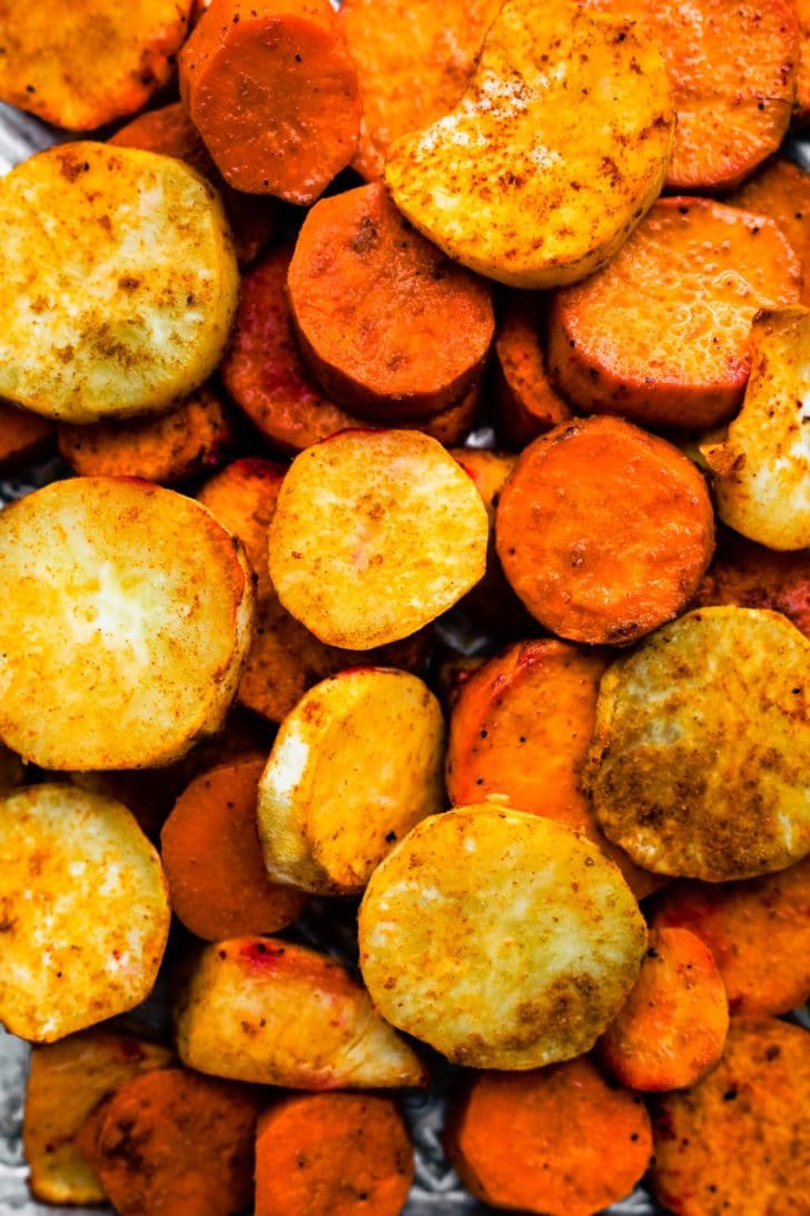 close up image of roasted potatoes, parsnip, and carrot chunks
