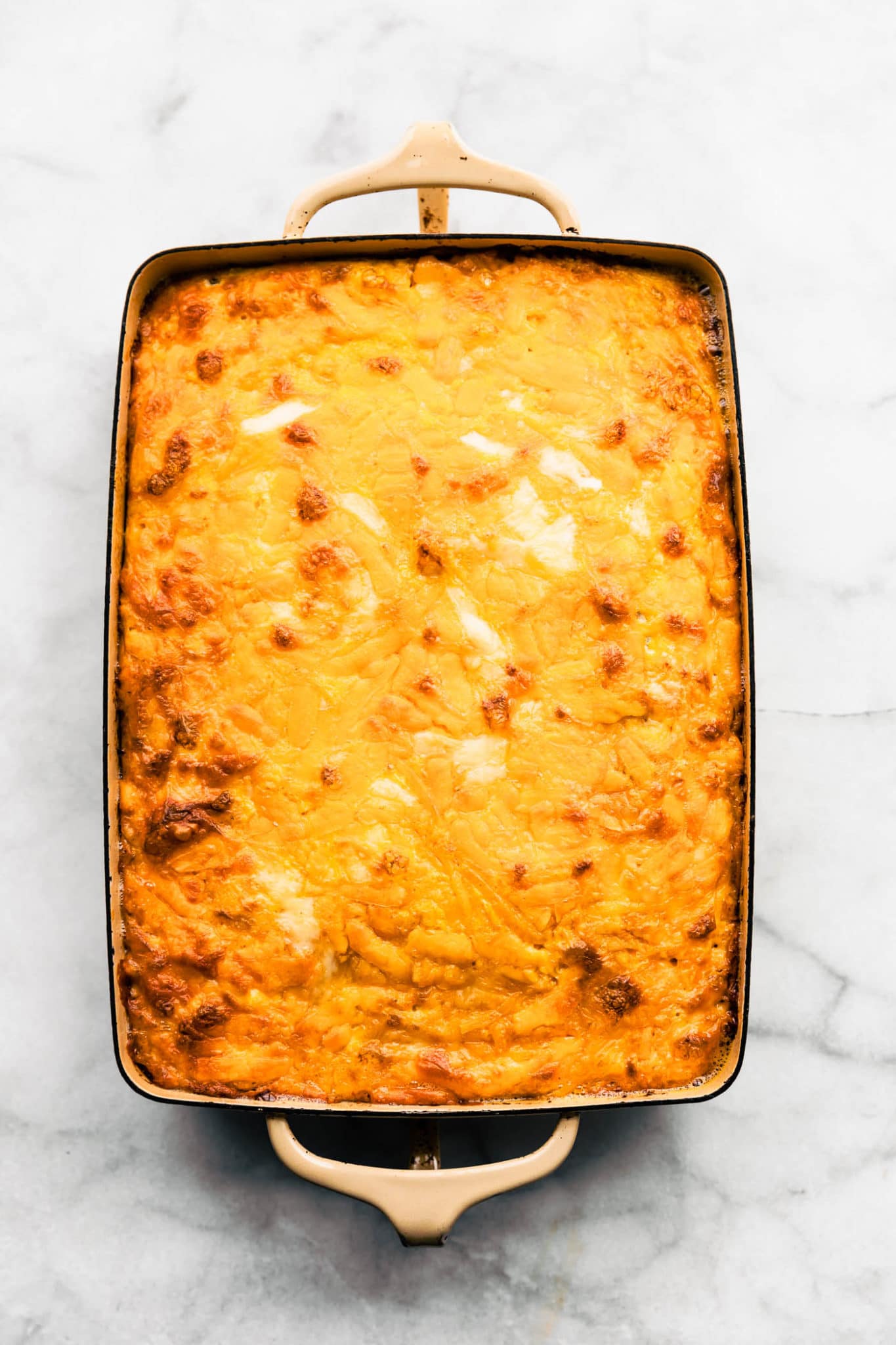 overhead image of a baked tex-mex egg and cauliflower casserole in a casserole dish