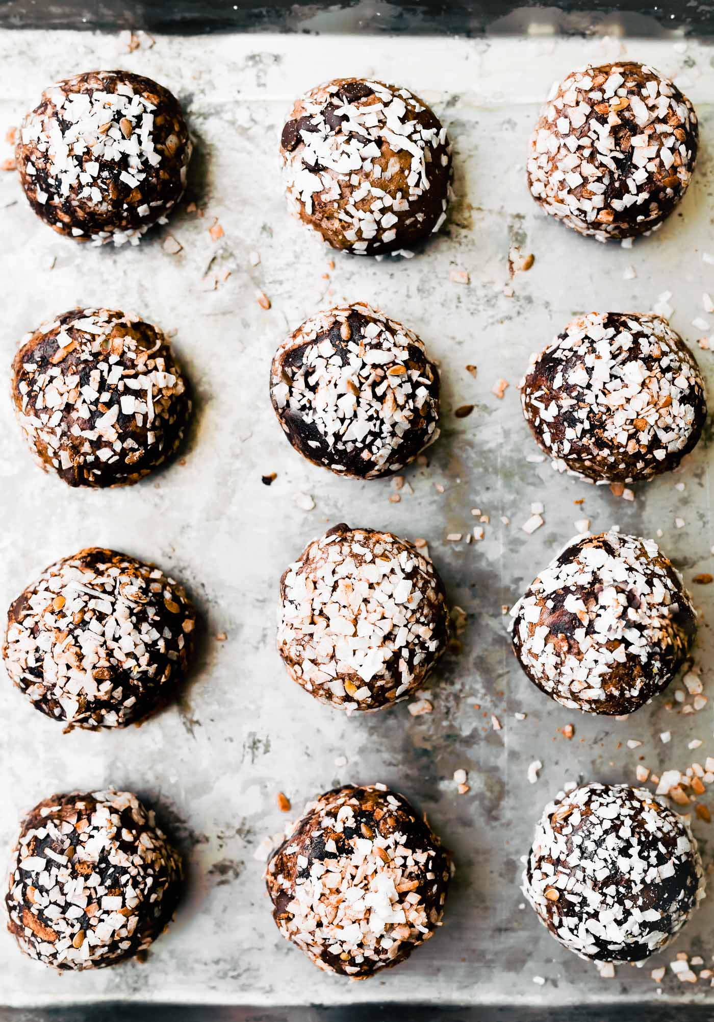 a sheet pan full of coconut chocolate protein balls