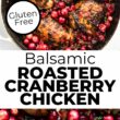 Balsamic Roasted Cranberry Chicken thighs in a white skillet topped with fresh thyme.