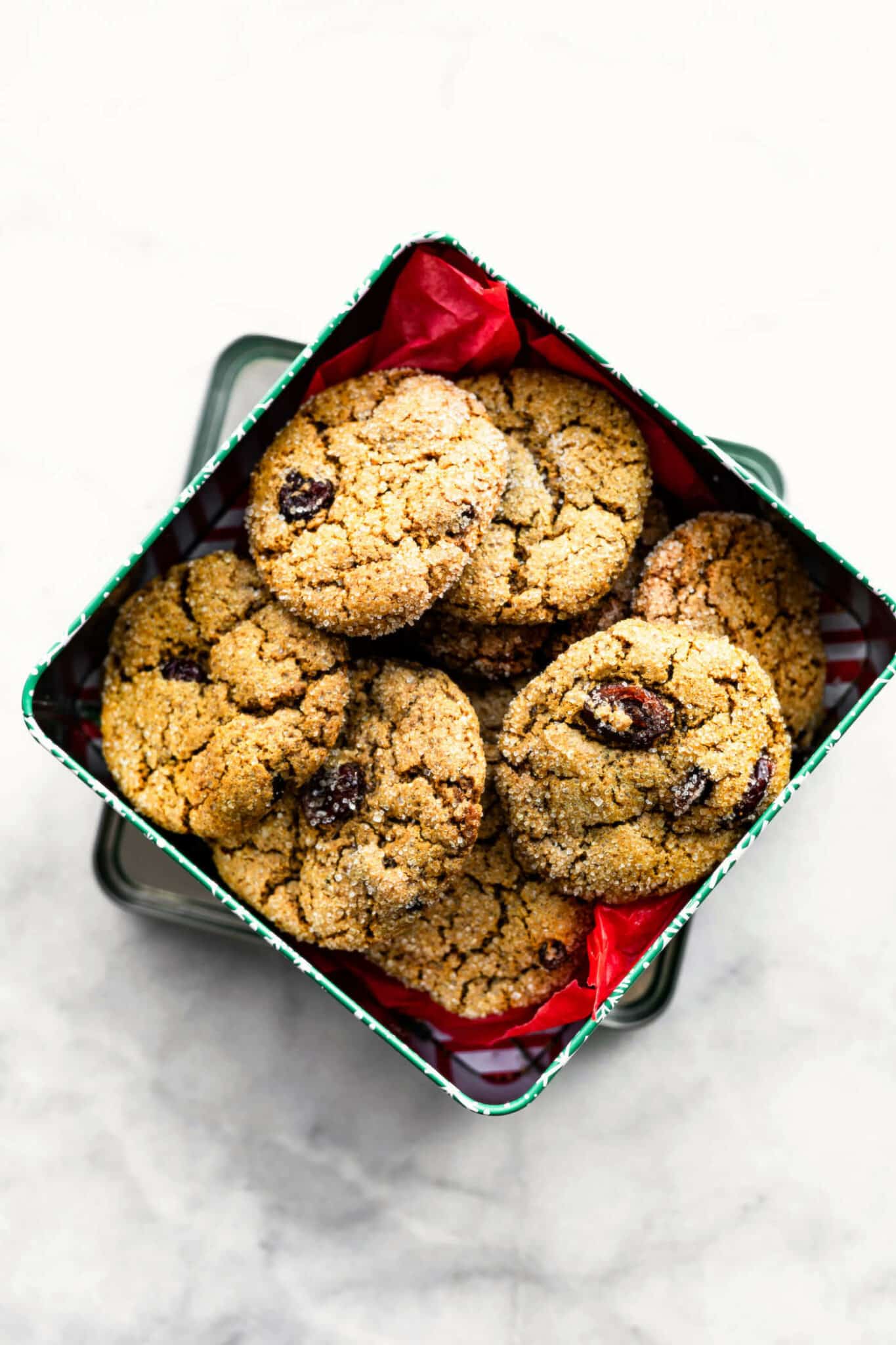 a box of baked vegan cranberry molasses cookies