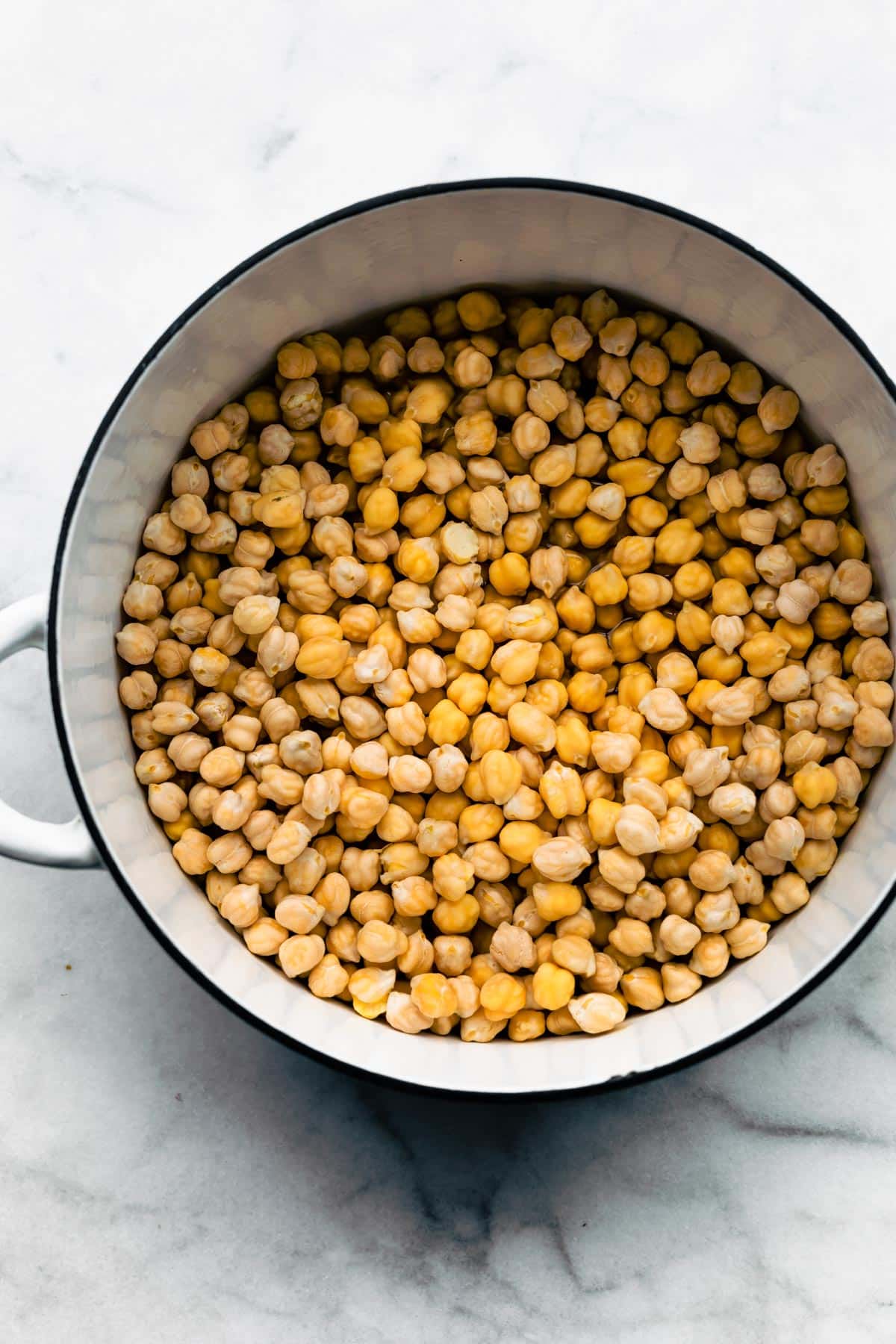 Overhead shot of Chickpeas in a White Pot