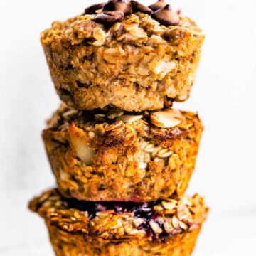 Three Baked Oatmeal Cups stacked on top of each other.