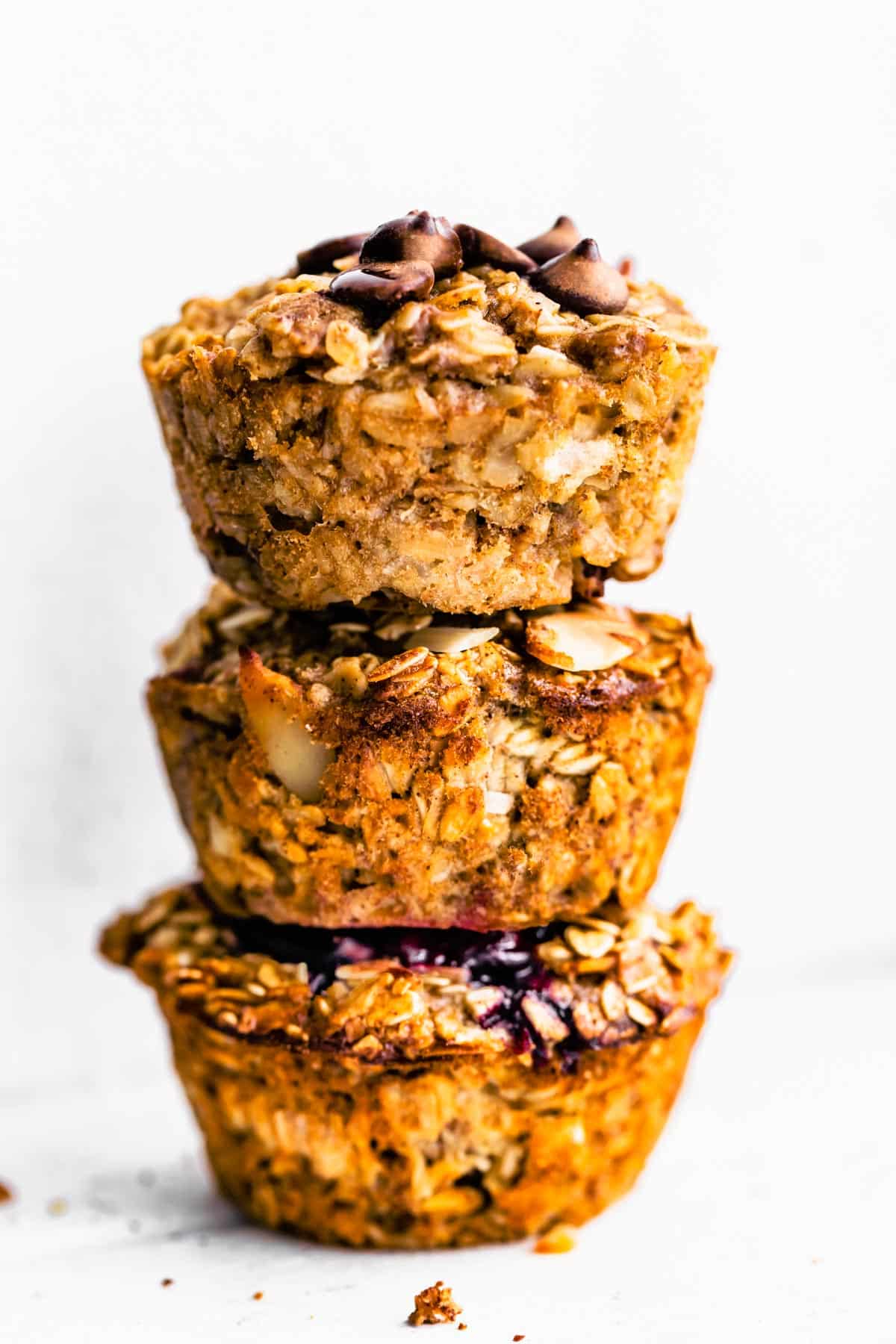 Three Baked Oatmeal Cups stacked on top of each other.