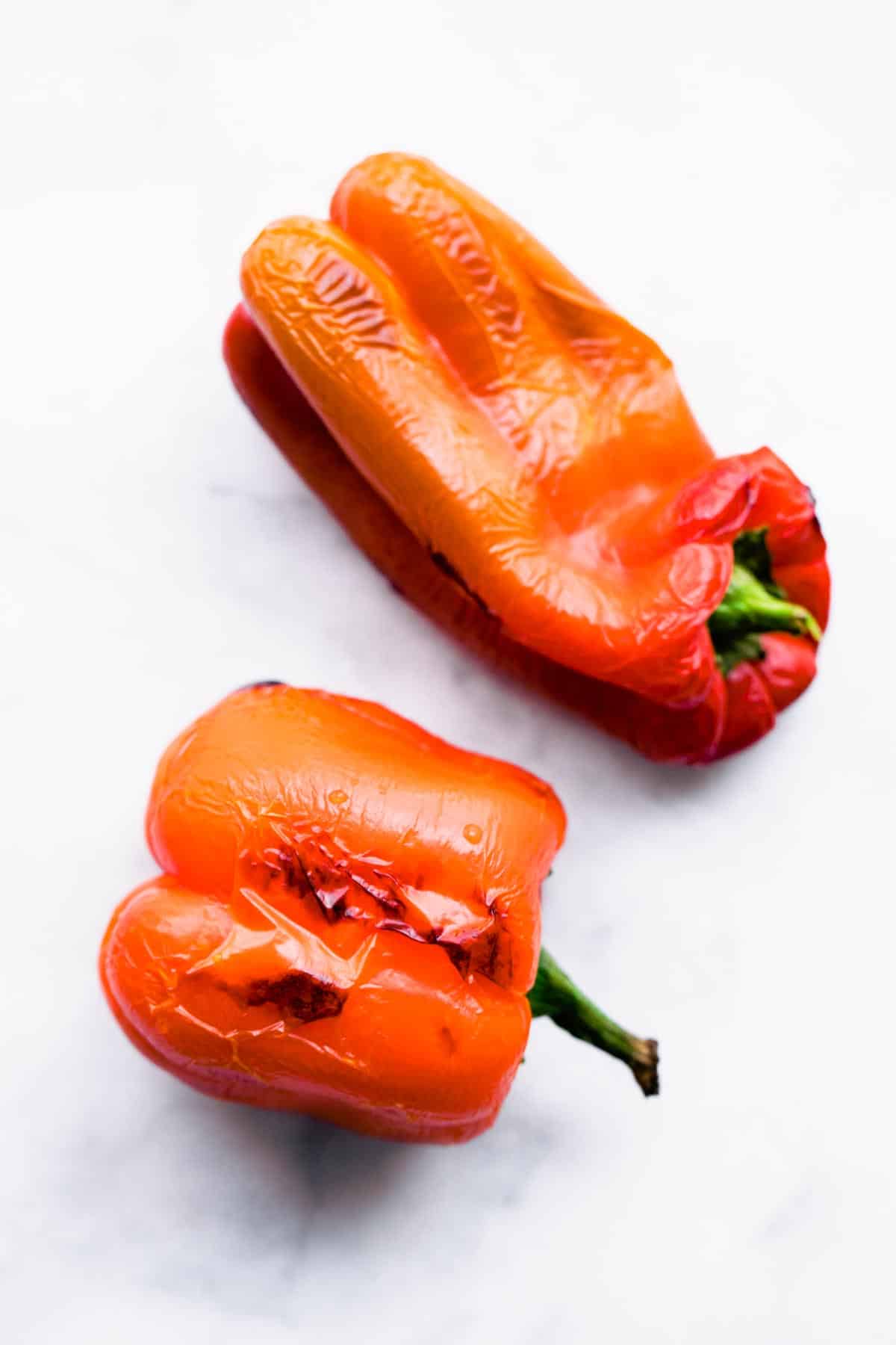 Two roasted red peppers.