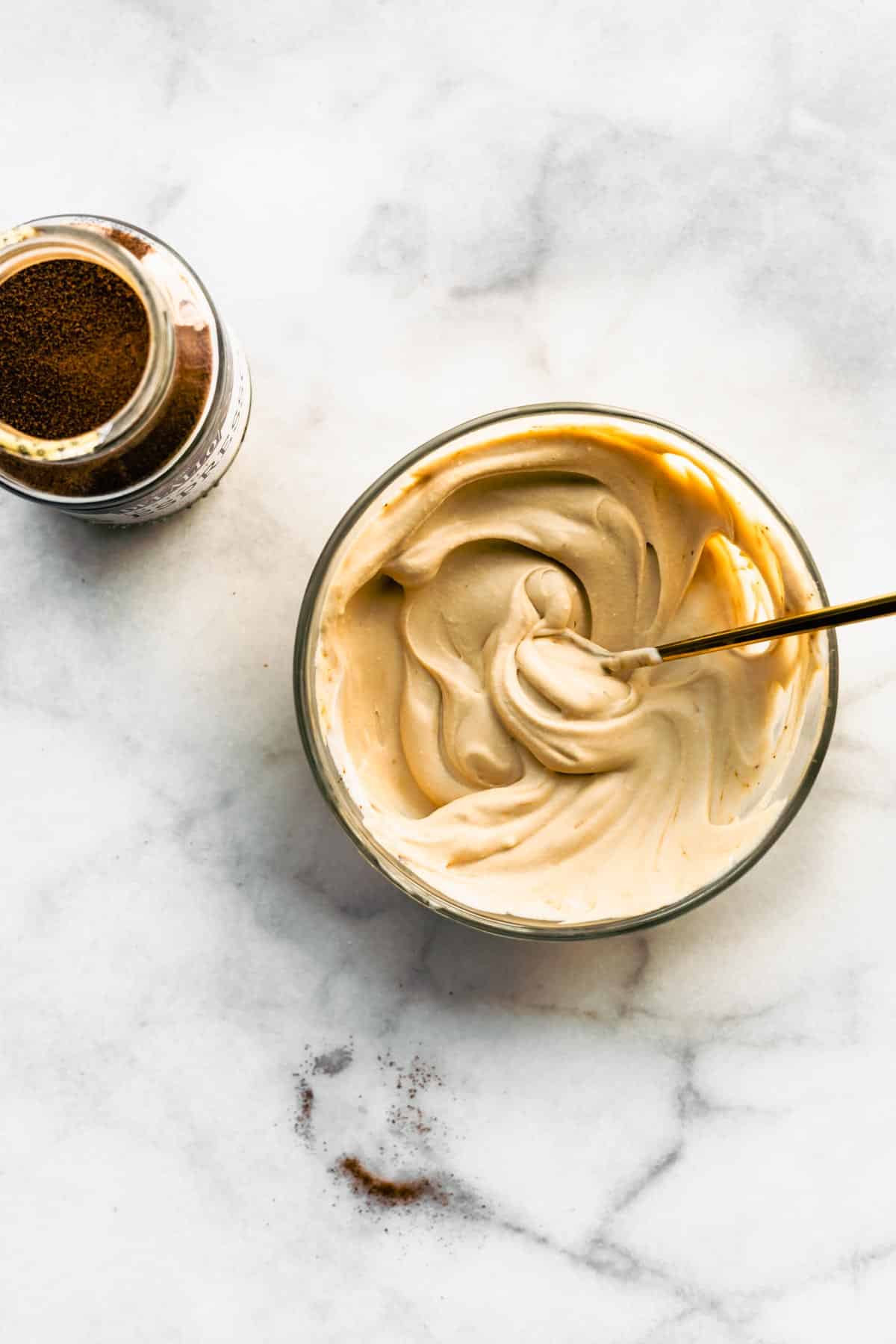 Whipped cream mixed with instant coffee to make instant coffee whipped cream.