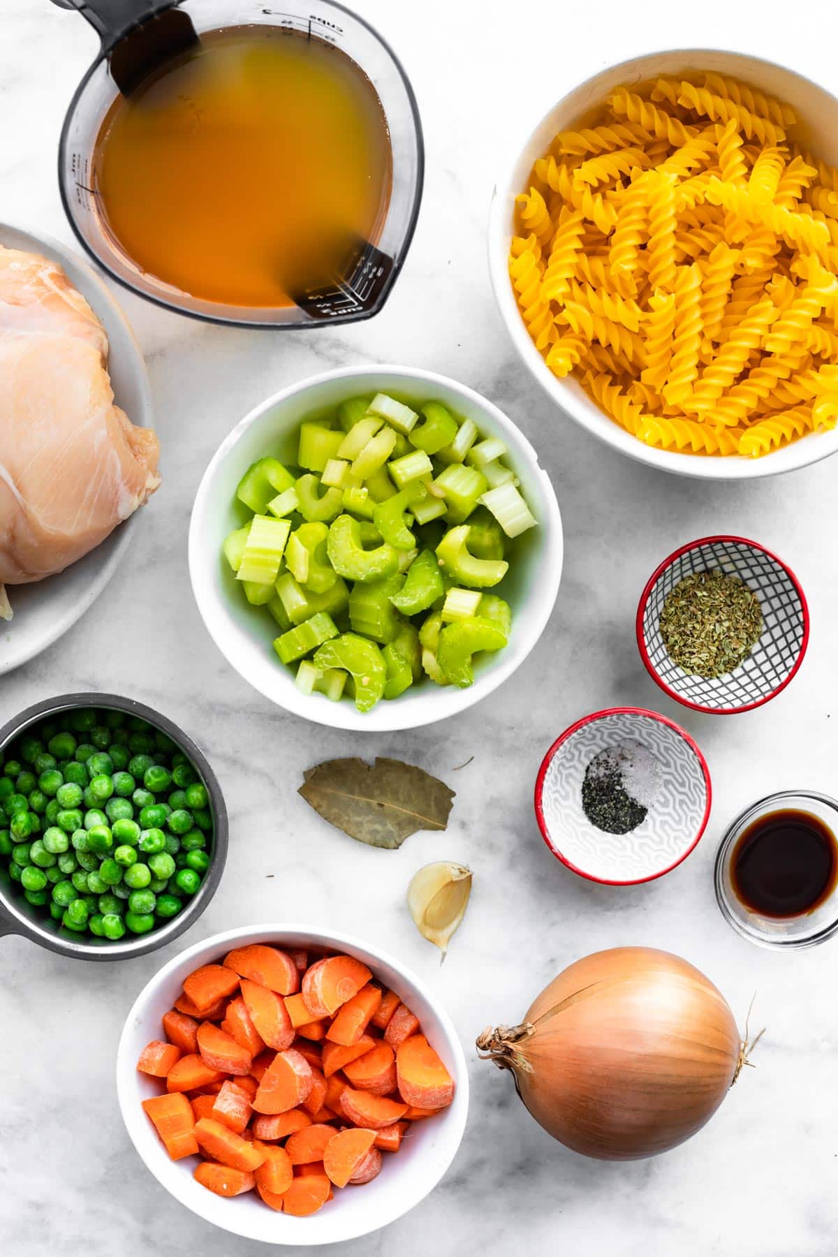 overhead image of ingredients for gluten-free chicken noodle soup