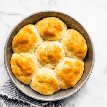 Browned Gluten Free Rolls in a pan.