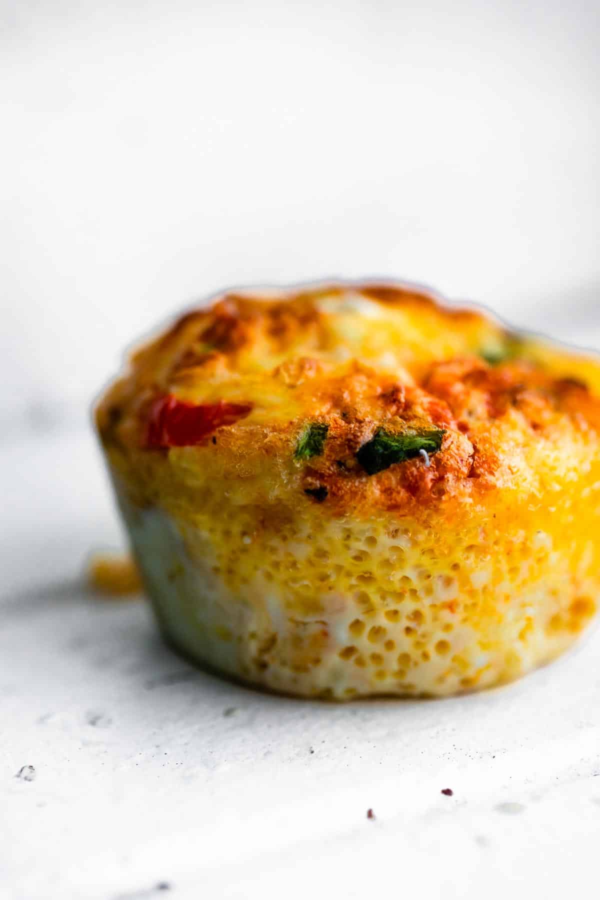 Side view of a cooked Frittata Muffin.
