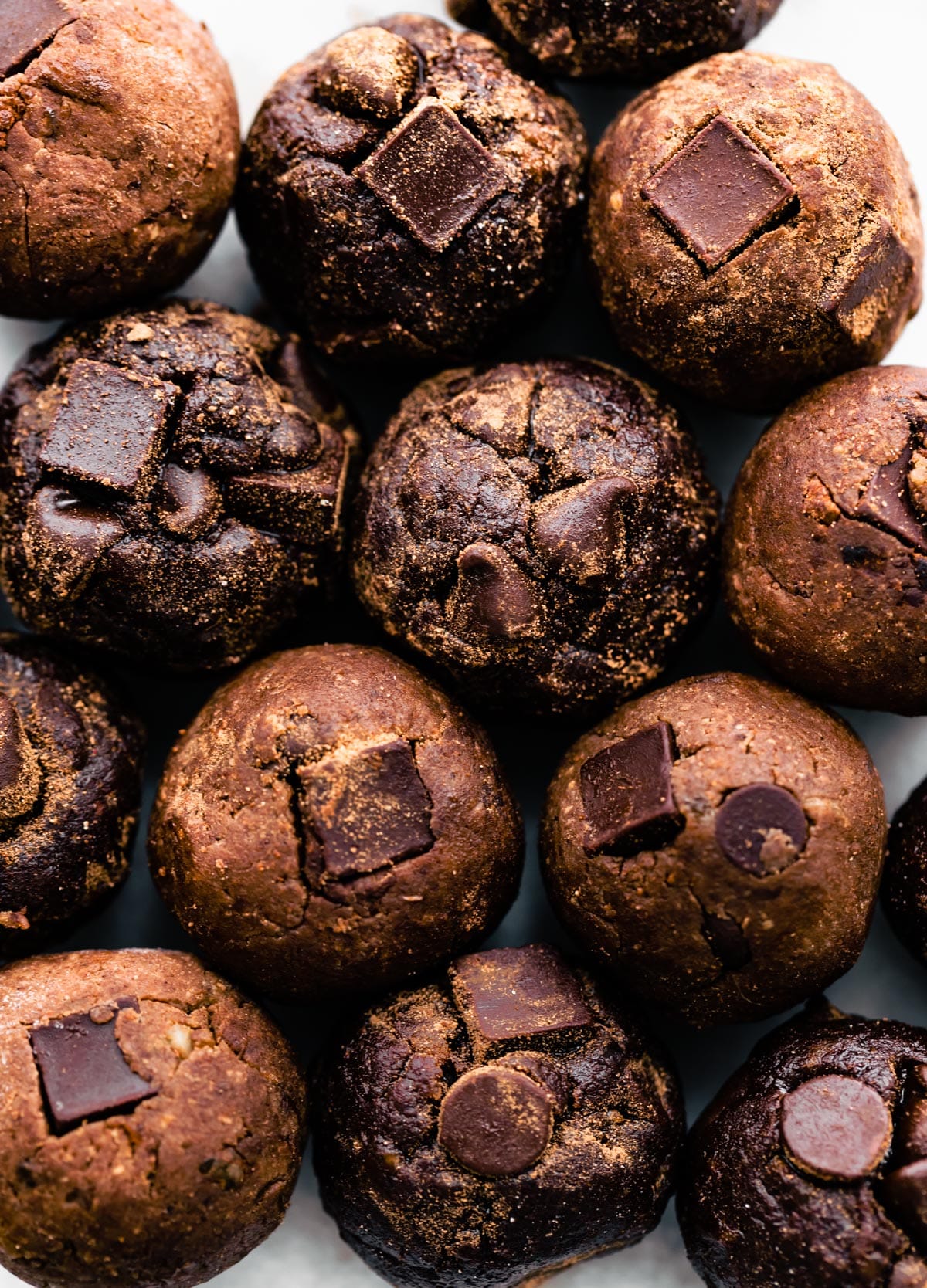 Close up image of chocolate nut-free protein balls made with chocolate chips and chocolate chunks.
