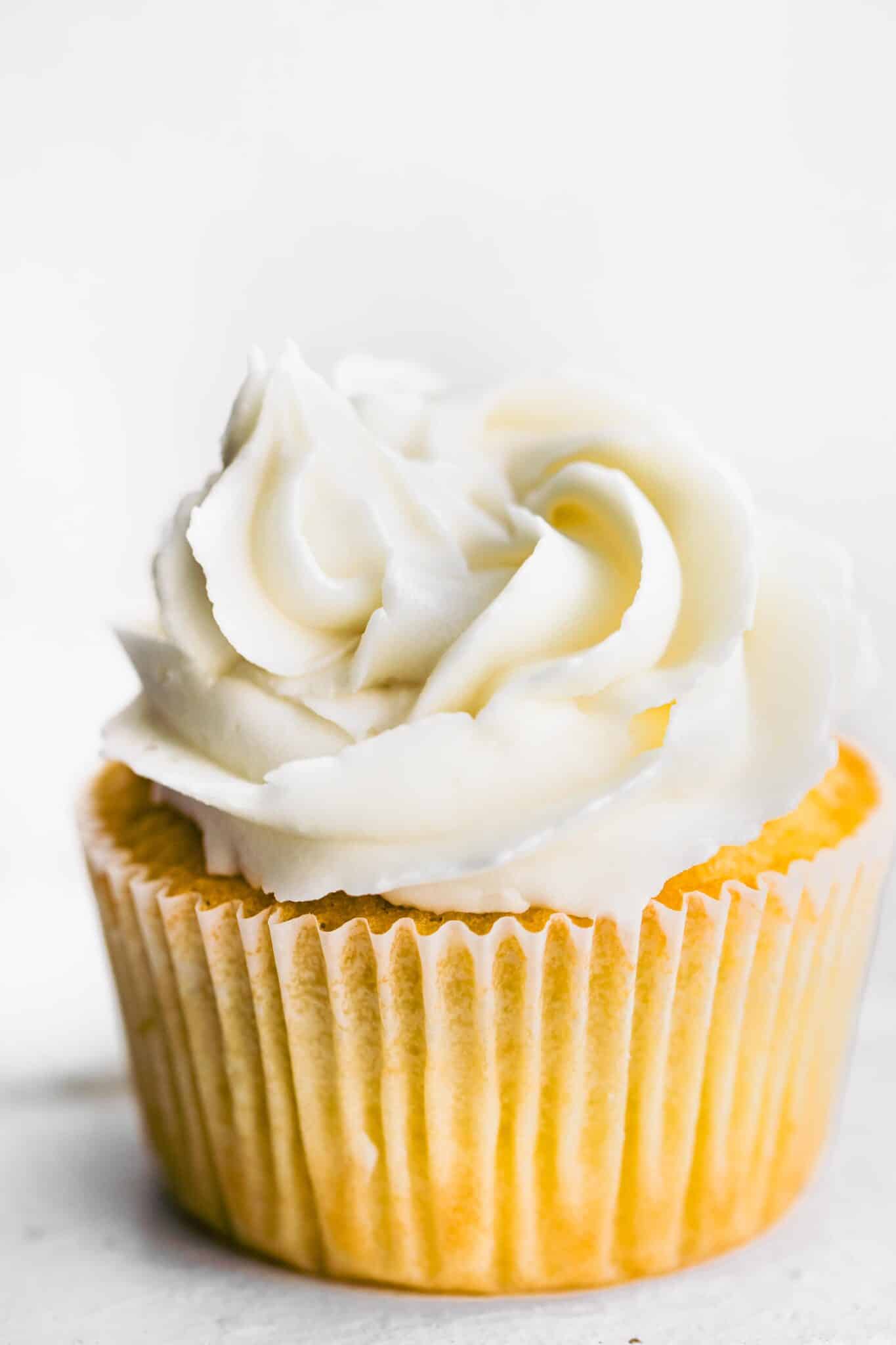Up close photo of low sugar vanilla cupcakes made with gluten free flour.