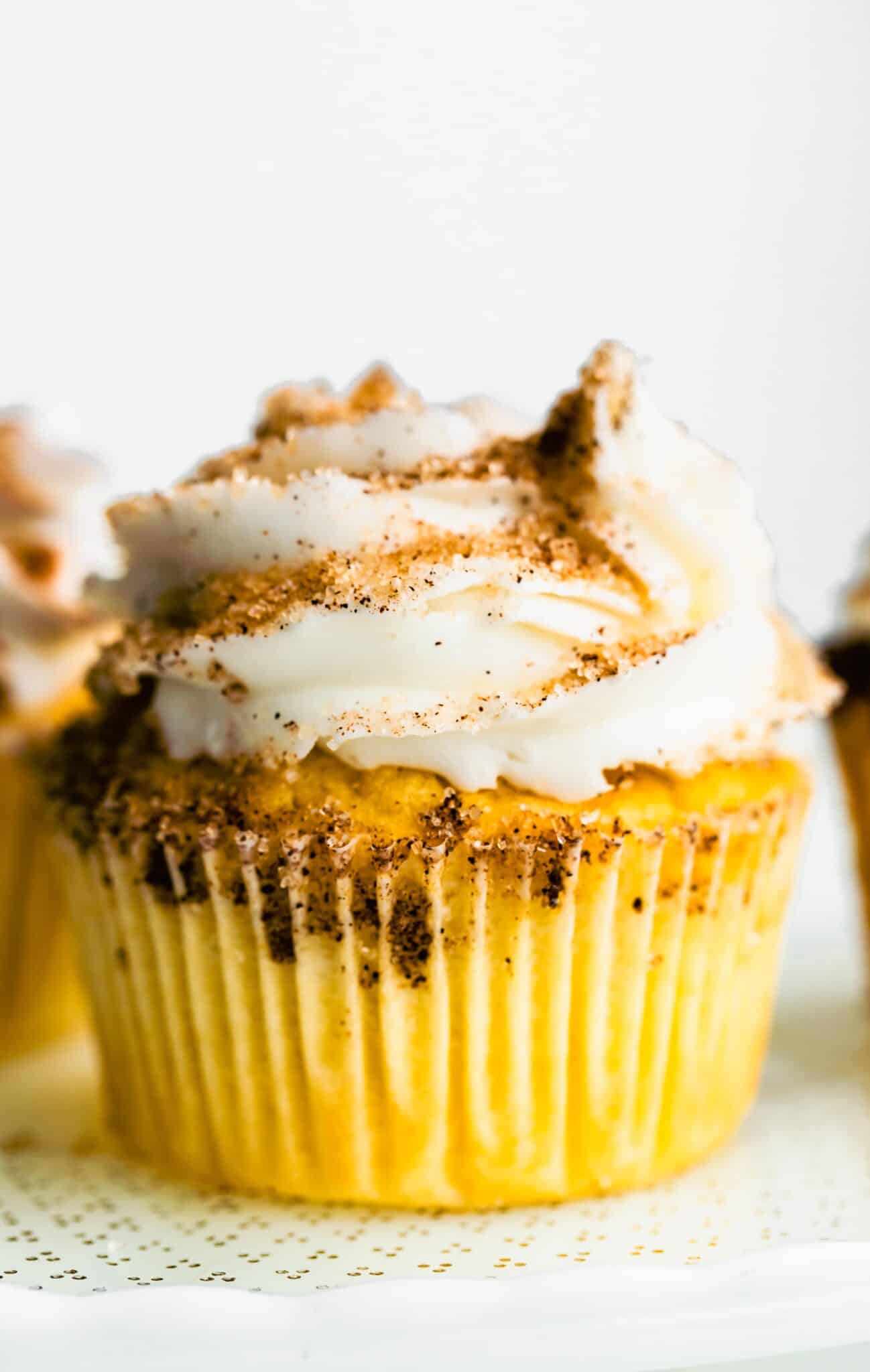 Up close photo of low sugar churro cupcakes made with gluten free flour.