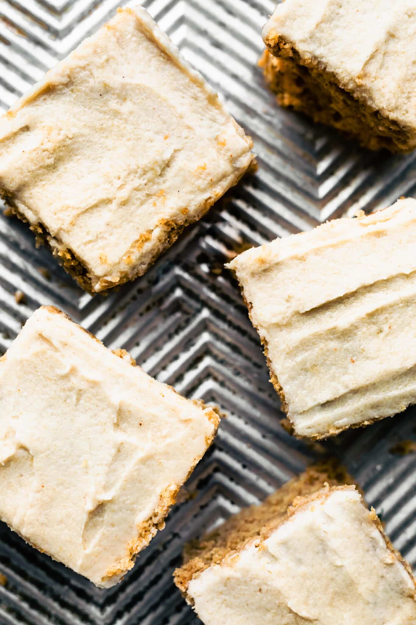 Overhead photo of banana bread bars frosted with vegan cashew frosting.