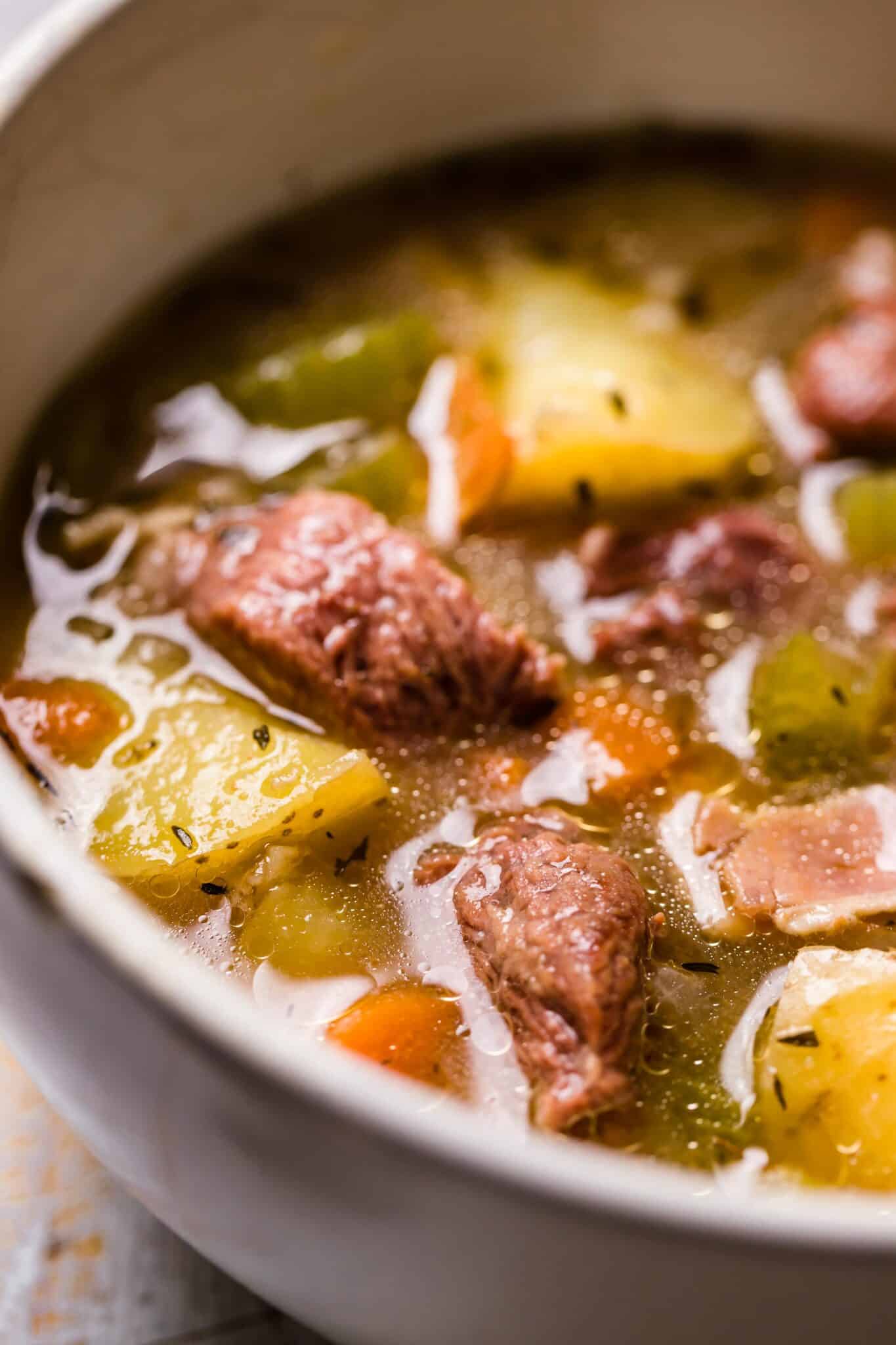 Up close photo of Irish Lamb Stew in a bowl with potatoes and vegetables.